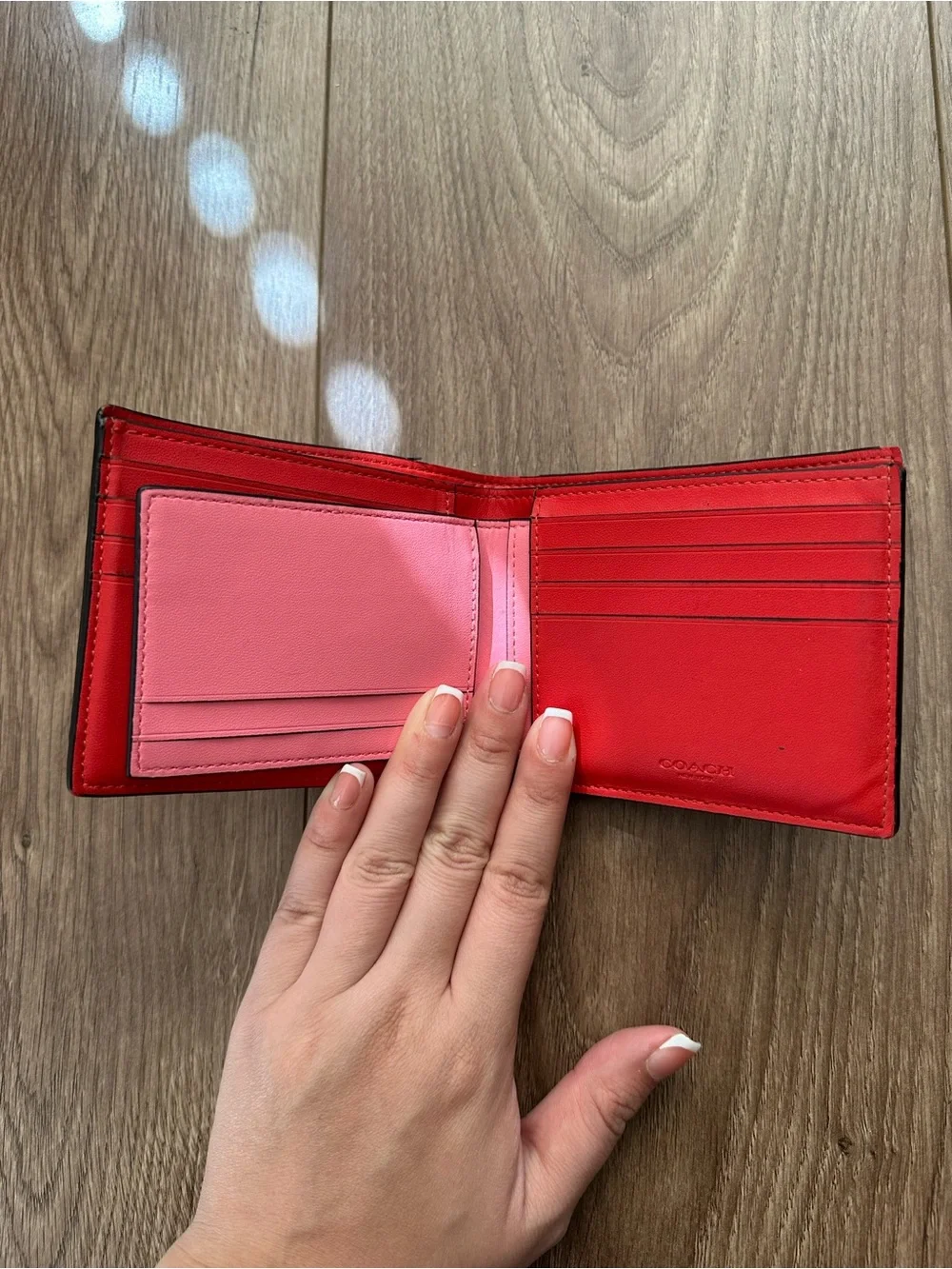 Coach Orange Signature Pattern Bifold Wallet